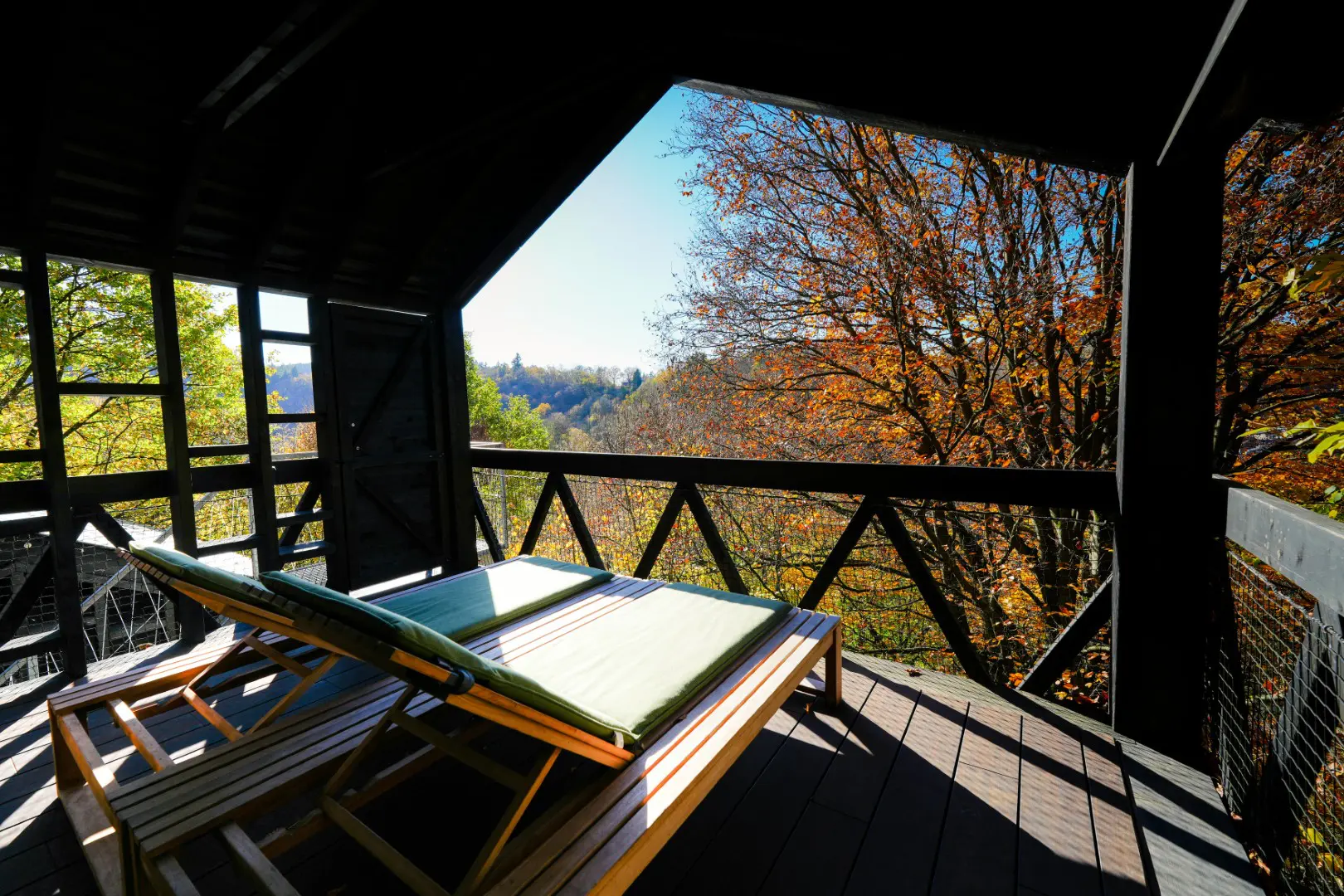 outdoor terrace with 2 loungebeds